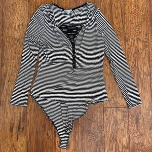 Long sleeved striped body suit